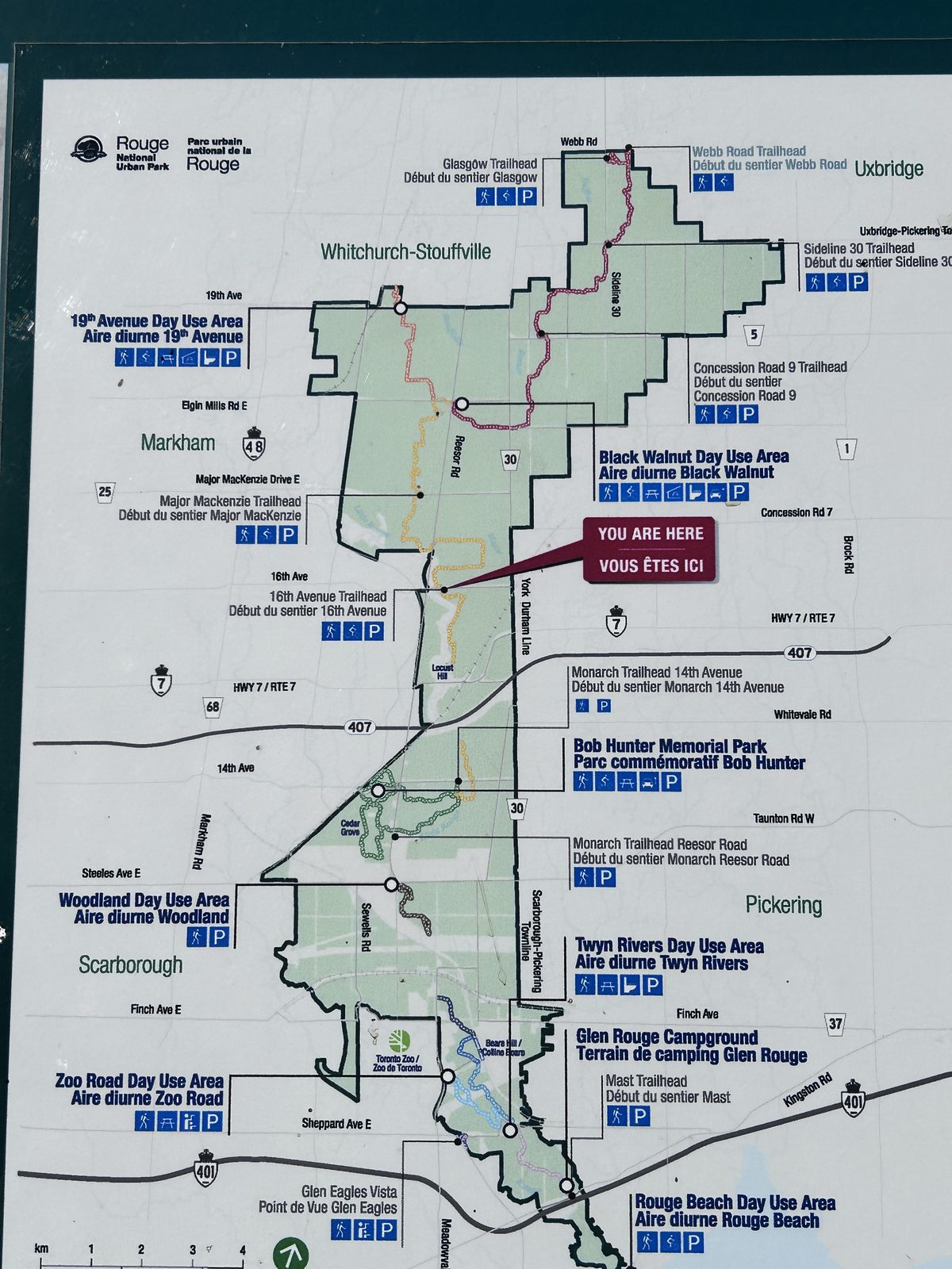 Rouge National Urban Park map board showing the park from Rouge Beach on Lake Ontario north to Uxbridge, with the 16th Avenue Trailhead marked You Are Here
